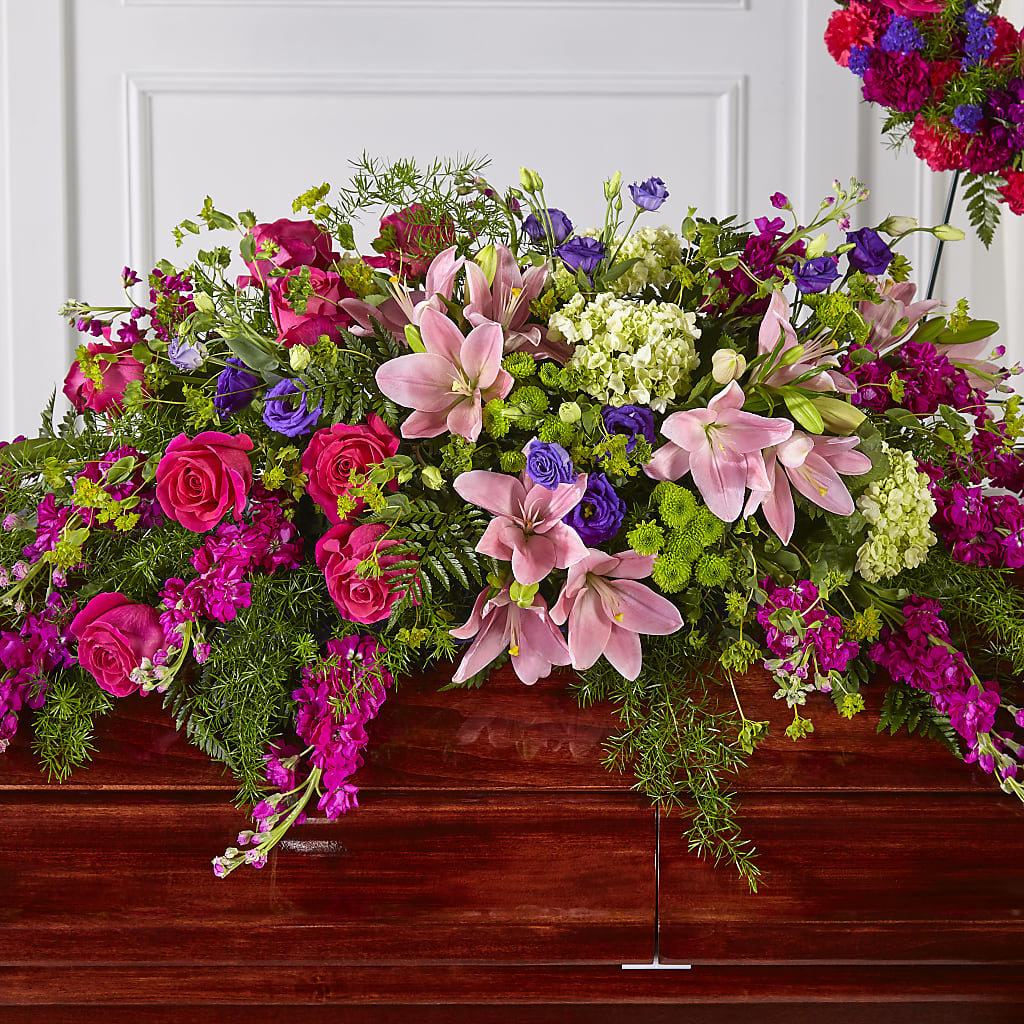 Radiant Tribute Casket Spray – Secret Garden By Leo, Chicago IL